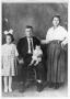 Primary view of [Jesus Cabezuela and his family in a family photograph]