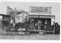 Thumbnail image of item number 1 in: '[Buggy with horse in front of store]'.