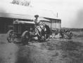 Photograph: [Man on tractor]