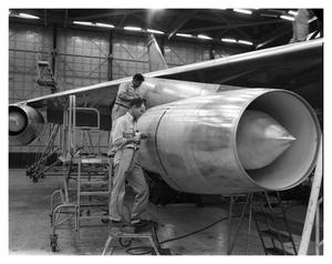 Primary view of object titled 'Crewmen Performing Assembly Work on B-58'.