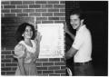 Thumbnail image of item number 1 in: '[Photograph of Students with Sing Poster]'.