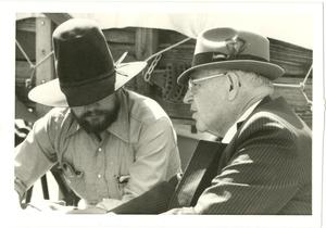 Primary view of object titled 'George Newman and Zane Mason engaging in Campfire Talk at Western Heritage Day'.