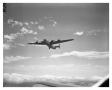 Photograph: [B-24 Liberator Bomber in Flight]