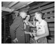 Photograph: [Lieutenant General William S. Knudsen Visits with Employees]