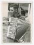 Photograph: [Soldier Playing Accordion]