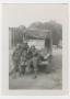 Photograph: [Three Soldiers with a Truck]