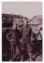 Thumbnail image of item number 1 in: '[Luther Ray and Pete Vickless in Front of Zimming Barracks]'.