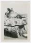 Photograph: [Soldier Standing in Tank Hatch]
