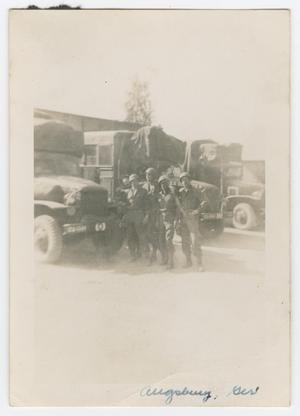 Primary view of object titled '[Five Soldiers Standing by Three Trucks]'.