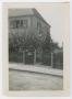 Photograph: [Gated Two-Story House]