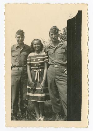 Primary view of object titled '[Two Soldiers and Woman]'.