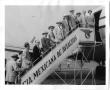 Photograph: Several Men Boarding Mexicana Airplane