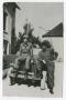 Photograph: [Soldiers with Jeep]