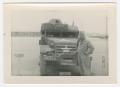 Photograph: [Rufus Baxter in Front of a Half-Track]