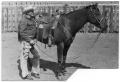 Photograph: Monte Foreman with Saddled Horse