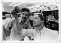 Photograph: Two Scientists and Petri Dish