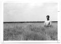 Photograph: [Photograph of a Man standing in Kleingrass]