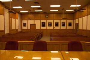 Primary view of object titled '[Benches in a Courtroom]'.