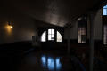 Photograph: [Photograph of a Darkened Courtroom]