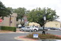 Photograph: [Cars by Lufkin ISD Administration Building]