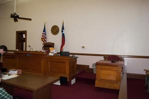 Primary view of object titled '[Desks in Courtroom]'.