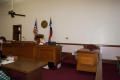 Thumbnail image of item number 1 in: '[Desks in Courtroom]'.
