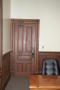 Photograph: [Wooden Door in Room]