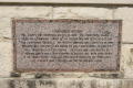 Photograph: [Pink Granite Plaque on Courthouse]