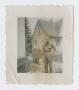 Photograph: [Soldier By House]