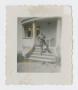 Photograph: [Soldier Standing on Steps]