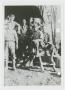 Photograph: [Soldiers In Front of Mess Truck]