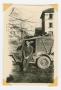 Photograph: [William Hahn Sitting on a Jeep]