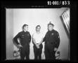 Photograph: [Oswald with Officers #2]