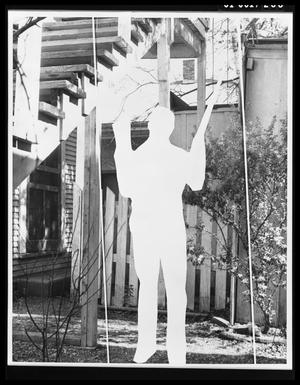 Primary view of object titled 'Figure in Backyard of 214 Neeley Street #1'.