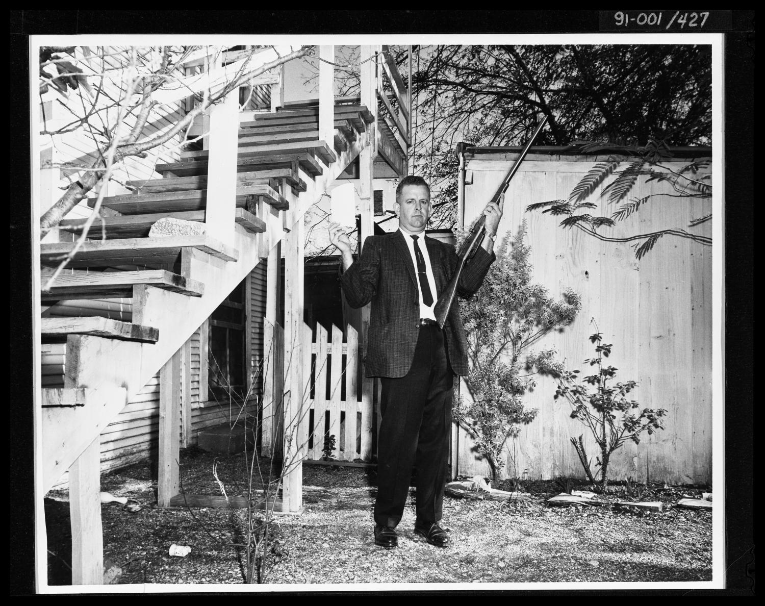 Man in Back Yard 214 Neeley Street
                                                
                                                    [Sequence #]: 1 of 1
                                                