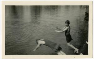 Primary view of object titled 'Evilyn and Lige Emmerson Jumping into the Guadalupe River, April 29, 1923'.