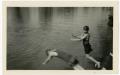 Primary view of Evilyn and Lige Emmerson Jumping into the Guadalupe River, April 29, 1923