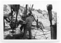 Primary view of Men Working on Rig