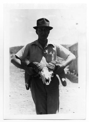 Primary view of object titled 'Bob King Holding Skull'.