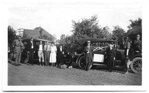 Primary view of object titled 'California Company Workers with Cars'.