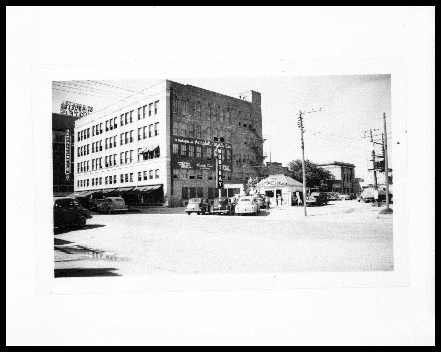 Exterior View of Hemphill Wells Department Store and Moutray Oil Service Station
                                                
                                                    [Sequence #]: 1 of 1
                                                