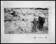 Photograph: Geological Formation & Man with Horse