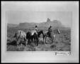 Photograph: Two Men Traveling With Four Horses and Foal