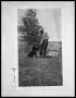 Photograph: Man with Dog and Fishing Pole