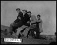 Thumbnail image of item number 1 in: 'Four Young Men Posing Outside'.