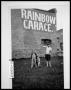 Thumbnail image of item number 1 in: 'Children and Dog in Front of the Rainbow Garage'.