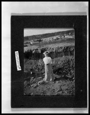 Primary view of object titled 'Woman Standing by Creek'.