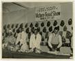 Photograph: [Men Butchering Meat at Victory Food Show]