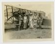 Photograph: [Men and Women in Front of Plane]