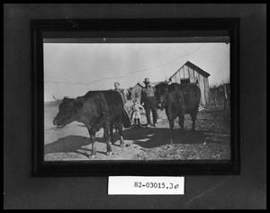 Primary view of object titled 'Man and Children with Cattle'.
